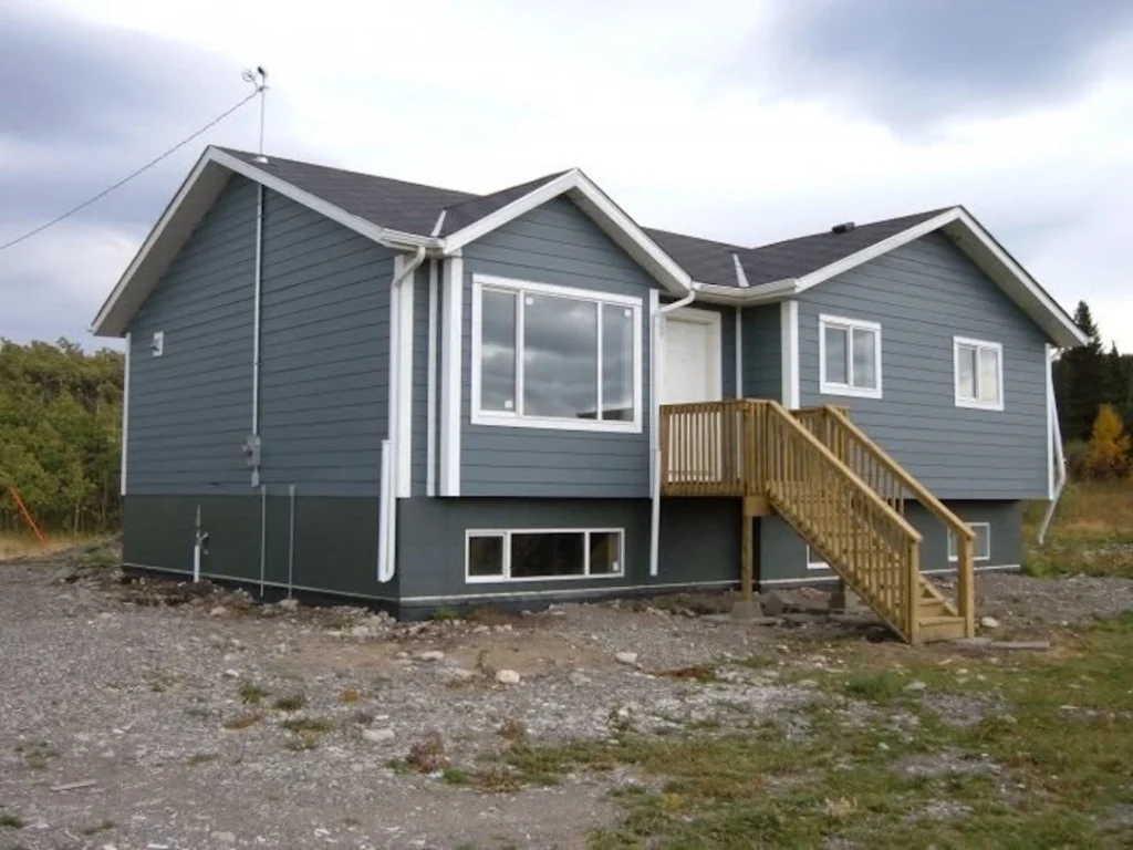 2011 Rhino Exteriors residential project with James Hardie siding parging and 50-year shingles exterior contractor Okotoks Alberta