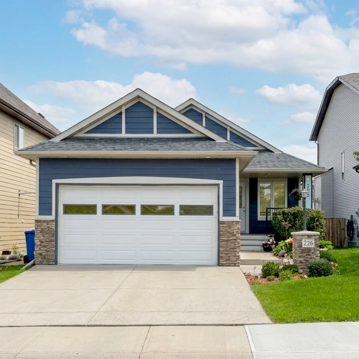 Exterior renovation project in Cimarron Okotoks completed by Rhino Exteriors featuring siding upgrades, roofing systems, and custom exterior detailing